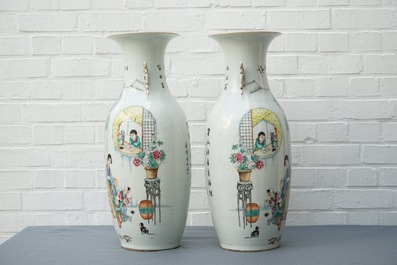 A pair of tall Chinese famille rose vases with figural design and calligraphy, 19/20th C.