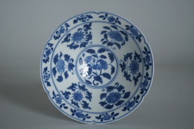 A Chinese blue and white bowl with flowers and fruits, 19th C.