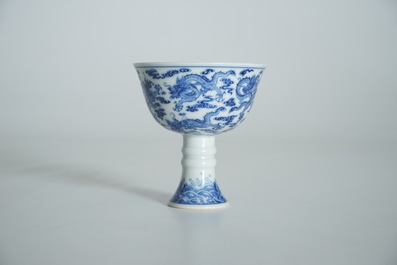 A Chinese blue and white nine-dragon stem cup, Yongzheng mark and poss. of the period