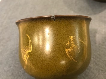 A pair of Chinese teadust-glazed and gilt wine cups with bats, Qianlong mark, 20th C.