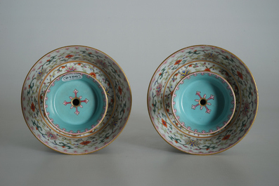 A pair of Chinese famille rose candlesticks, Jaiqing mark, 19/20th C.