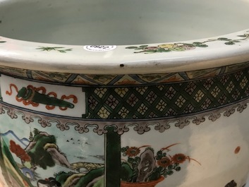 A Chinese famille verte fish bowl with figural design, 19th C.