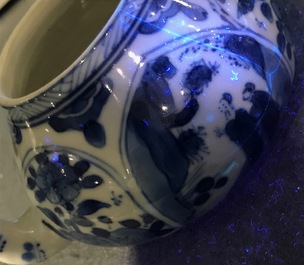 A Chinese blue and white teapot with figurative and floral panels, Kangxi