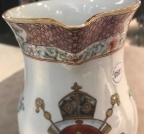 A large Chinese famille rose armorial jug with floral design, Yongzheng