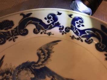 A pair of Chinese Pronk studio eggshell plates with parrots on a perch, Yongzheng/Qianlong