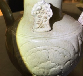 A Chinese greenware ewer with incised peony design, Song