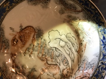 Une tasse et soucoupe en porcelaine de Chine anhua &agrave; d&eacute;cor polychrome de cerfs, Yongzheng