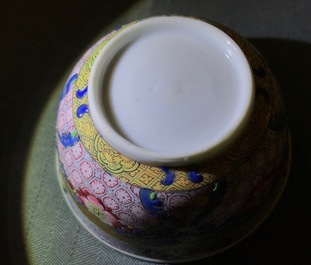 A Chinese famille rose cup and saucer with a cat, Yongzheng