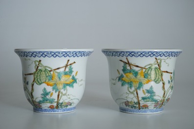 A pair of small Chinese famille rose jardinieres on wooden stands, early 20th C.