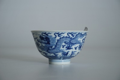 A Chinese blue and white dragon bowl, Daoguang mark, 19/20th C.