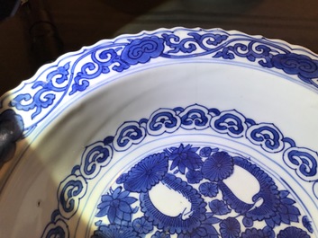 A Chinese blue and white bowl with figures, Kangxi, and a klapmuts crane bowl, probably Wanli