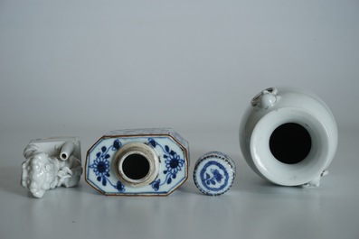 A Chinese Dehua blanc de Chine temple lion, a vase and a blue and white tea caddy, Kangxi and later