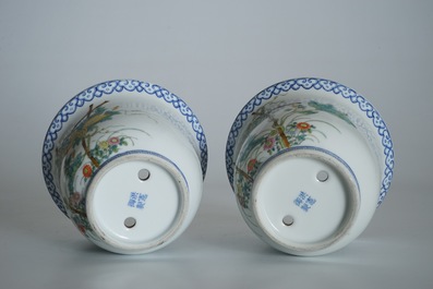 A pair of small Chinese famille rose jardinieres on wooden stands, early 20th C.