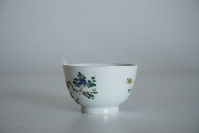 A Chinese famille verte cup and saucer with yin-yang mark, Kangxi