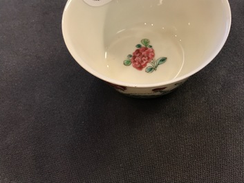 Two Chinese famille rose cups and three saucers with floral design, Yongzheng/Qianlong