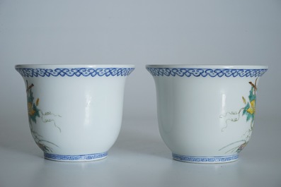 A pair of small Chinese famille rose jardinieres on wooden stands, early 20th C.