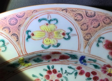 A pair of Chinese famille rose plates with a Dutch nobleman, Qianlong