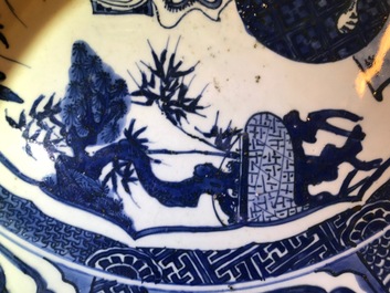A very large Chinese blue and white kraak porcelain charger with a dragon, Wanli