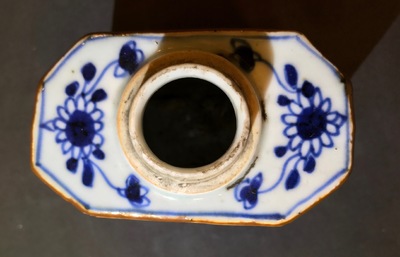 A Chinese Dehua blanc de Chine temple lion, a vase and a blue and white tea caddy, Kangxi and later