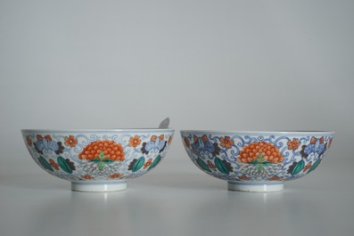 A pair of Chinese doucai bowls with floral famille rose medallions, 4-character mark, 19/20th C.