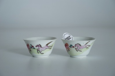 A pair of Chinese famille rose cups and saucers with horse design, Yongzheng/Qianlong