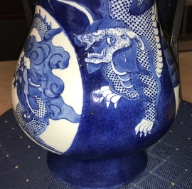 A Chinese blue and white relief-decorated hu vase with mythical beasts, Chenghua mark, 19/20th C.