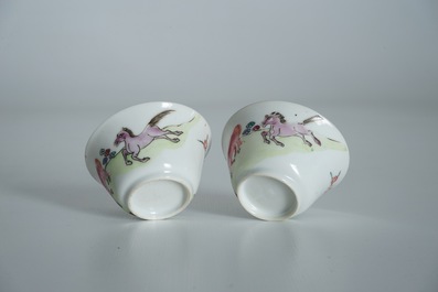 A pair of Chinese famille rose cups and saucers with horse design, Yongzheng/Qianlong