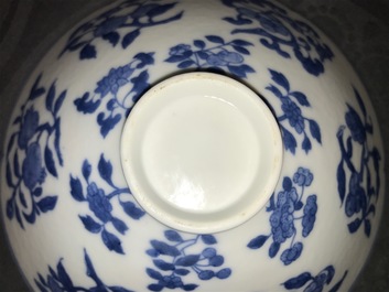 A Chinese blue and white bowl with flowers and fruits, 19th C.