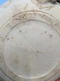 Een Chinese monochrome cr&egrave;me-geglazuurde inktsteen, Yuan/Song of later