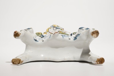 A polychrome Brussels faience Rococo watch stand, 18th C.