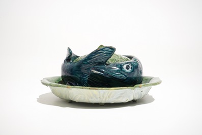 A polychrome Dutch Delft eel-shaped tureen and cover on stand, 18th C.