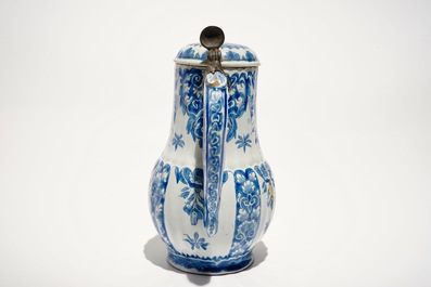 A Dutch Delft blue and white jug and cover with pewter mount, 18th C.