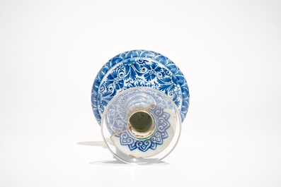 A Dutch Delft blue and white candlestick, 1st half 18th C.