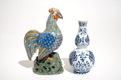 A polychrome Delft style rooster and a blue and white vase, D&egrave;svres, France, 19th C.