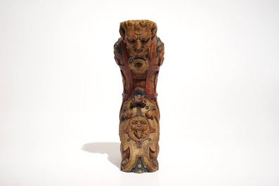 A wooden beam support in the shape of a satyr above a lion crest, The Netherlands, 17th C.