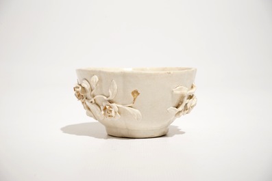 A Doccia porcelain cup and saucer with applied floral design, Italy, 18th C.