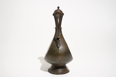 An inscribed Islamic bronze ewer, Qajar, Iran, 19th C.