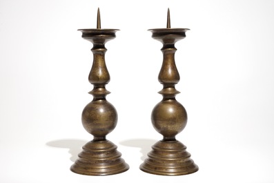 A pair of large Flemish bronze pricket candlesticks, 17th C.