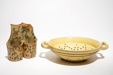 A French stoneware strainer and a wall hanger for cutlery, Aiglefontaine, 18th C.