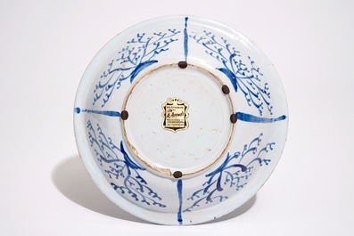 A rare blue and white French faience trembleuse, Nevers, 17th C.