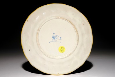 An Italian maiolica plate with a putto, Cantagalli, 19th C.