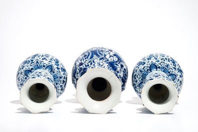 Three Dutch Delft blue and white garlic neck vases with birds on millefiori design, 18th C.