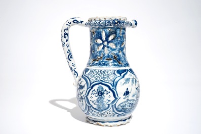 A Dutch blue and white chinoiserie puzzle jug, Delft or Rotterdam, dated 1734