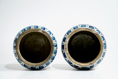 A pair of large blue and white Antwerp maiolica &quot;A foglie&quot; albarelli, 16th C.