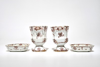 A pair of Dutch Delft manganese jardinieres on stands with floral designs, 18th C.