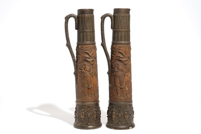 A pair of massive German stoneware beer steins, 19/20th C.