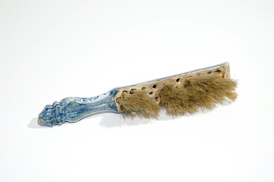 A Dutch Delft blue and white brush with handle, 1st half 18th C.