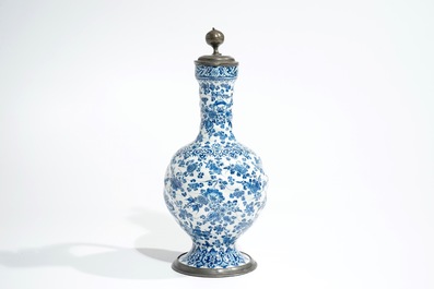 An attractive Dutch Delft blue and white gadrooned pewter-mounted jug, 2nd half 17th C.