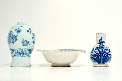 A blue and white French faience shaving bowl, a chinoiserie vase and a jug, Nevers and Moustiers, 17/18th C.