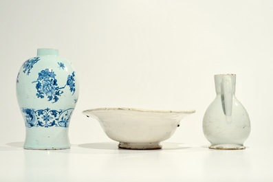 A blue and white French faience shaving bowl, a chinoiserie vase and a jug, Nevers and Moustiers, 17/18th C.